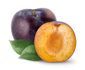 Isolated plums. Whole and a half of blue plum fruit with leaves isolated on white background