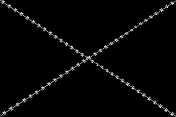 Fototapeta na wymiar Barbed wire on black background