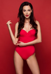 Fashionable woman wear red swimsuit