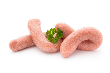 Raw sausages with herbs and spices.