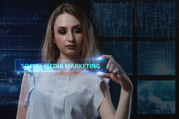The concept of business, technology, the Internet and the network. A young entrepreneur working on a virtual screen of the future and sees the inscription: Social media marketing