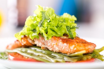 Fried fish with vegetables.