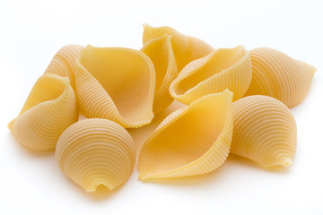 Italian lumaconi isolated on white background.