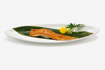 Anago sushi (Unagi sushi) in white plate on white background