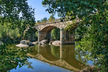 Fototapeta na wymiar Stone bridge over Tamega river in Boticas, Portugal