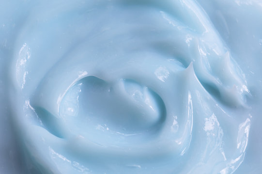 Texture of blue cosmetic cream. View from above.