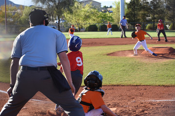 youth baseball at bat