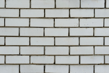 Fototapeta premium Brick texture with scratches and cracks