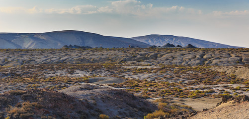 Tourists on mud volcanoes in Gobustan