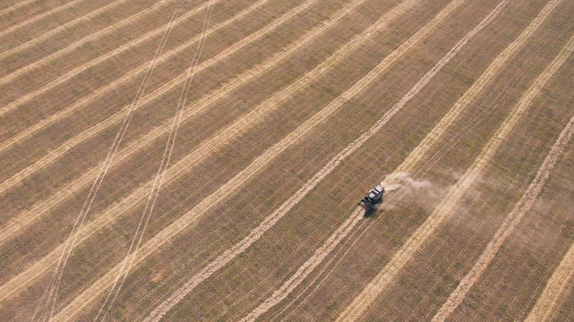 Aerial view of tractor moving in field