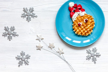 breakfast for child on Christmas with waffle top view