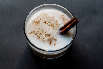Horchata with Cinnamon stick and ice.