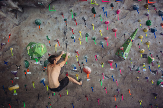 Free Climber on bouldering wall