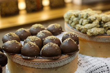 chocolate candies with filler lined in the display case