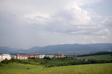 Fototapeta premium Sunrise and sunset over the buildings in the Zilina city. Slovakia