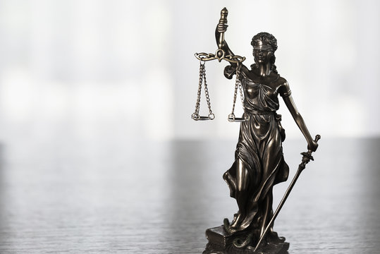 Legal office of lawyer.  legal  model statue of Themis goddess of justice.