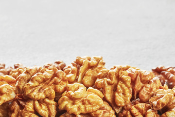Close up picture of walnuts, shallow depth of field, space for text.