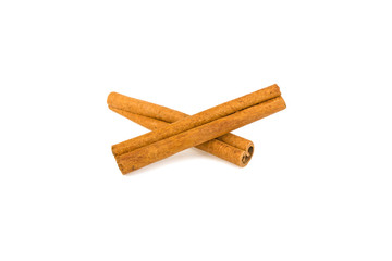 Two cinnamon sticks on a white background
