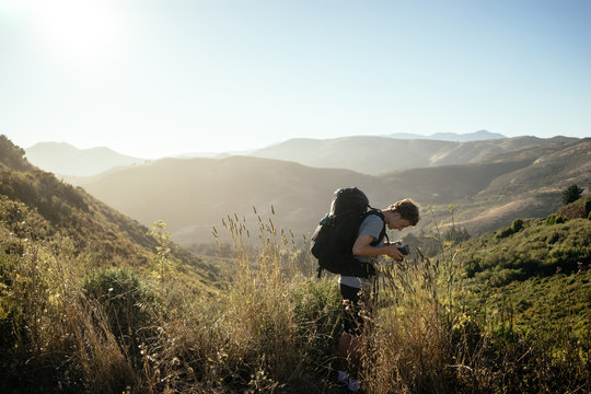 photographer revising image of landscape in california