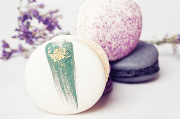 Fototapeta na wymiar colorful macaroon cakes against white background