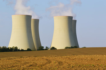 nuclear power plant, cooling towers and field