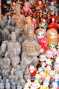 Chinese souvenirs. Various asian figures in the gift shop in Shanghai