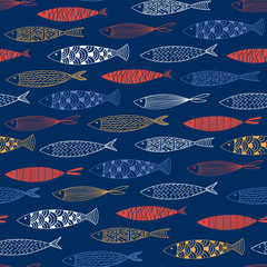 Seamless pattern with fish on a blue background