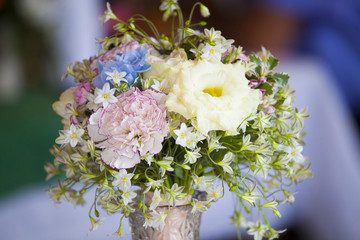 Flower bouquet on wedding table