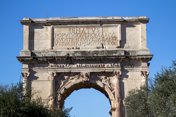 Fototapeta na wymiar Arch of Constantine near colosseum in Rome