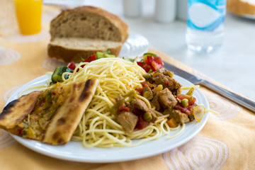 Plate with pasta and meat