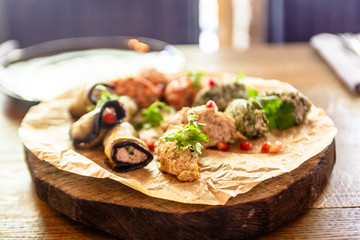 Traditional Georgian cuisine snacks - rolls of eggplant and 
