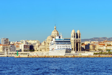 Fototapeta na wymiar View from the sea to Marseille, cruise ship, cathedral, France