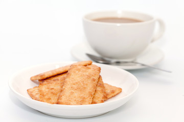coconut cracker biscuit and coffee on white background