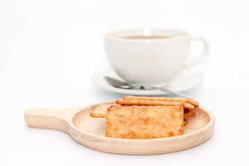 coconut cracker biscuit on plate on  white background