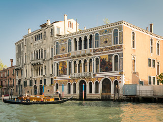 Naklejka premium Historic buildings on the banks of the grand canal in Venice.
