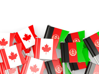 Flag pins of Canada and Afghanistan  isolated on white