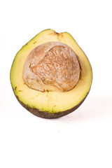Slice of avocado with its seed.