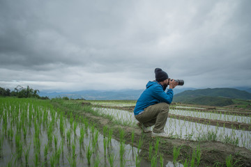 Young man asian photographers with shoot photo