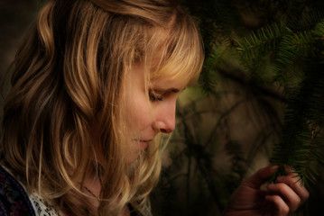 Blonde woman in forest