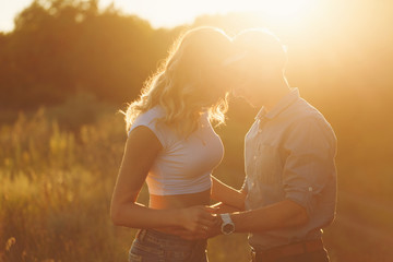 Couple in love at sunset