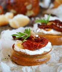 Bruschetta with cottage cheese and sun-dried tomatoes