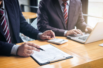 Co working conference, Business team meeting present, investor colleagues discussing new plan financial graph data on office table with laptop and calculator, Finance, accounting, investment