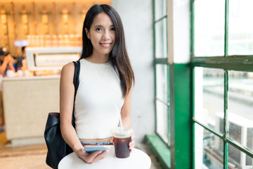 Young woman in coffee shop