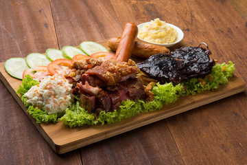 roasted pork knuckle ribs ,sausage and mash potatoes
