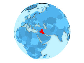 Iraq on blue globe isolated