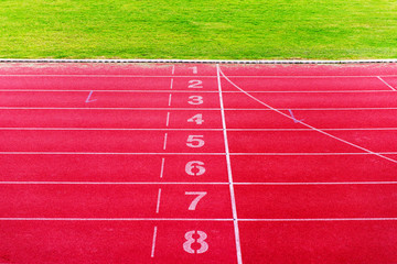Finish line on athletics,Red running track in stadium