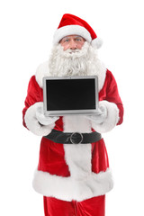 Santa Claus holding laptop on white background