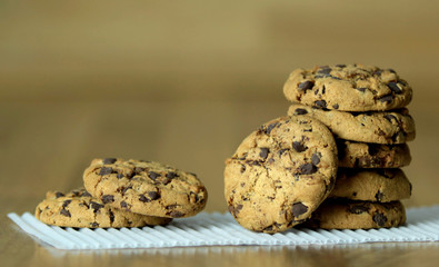 Chocolate cookies on wooden background. Close up view.