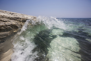 Wave and white rock near Governor's beach, Cyprus. Sea landscape.