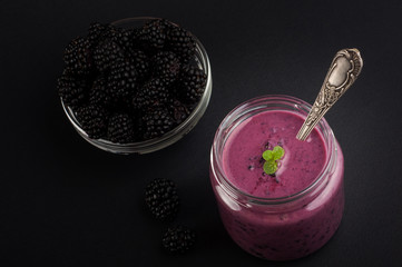 Blackberry yogurt smoothie in glass and fresh berries series